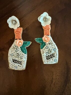 “ Rose All Day” in these Beaded Rose Bottle Statement Earrings